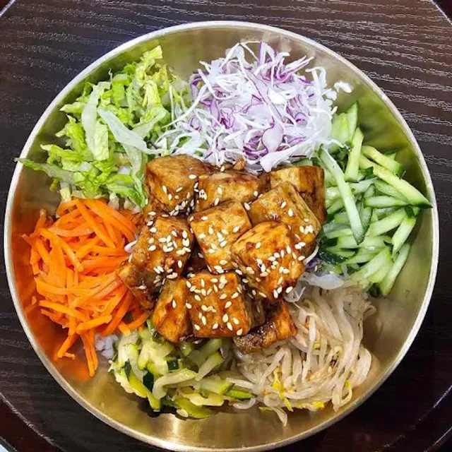 Tofu and vegetables bibimbap bowl