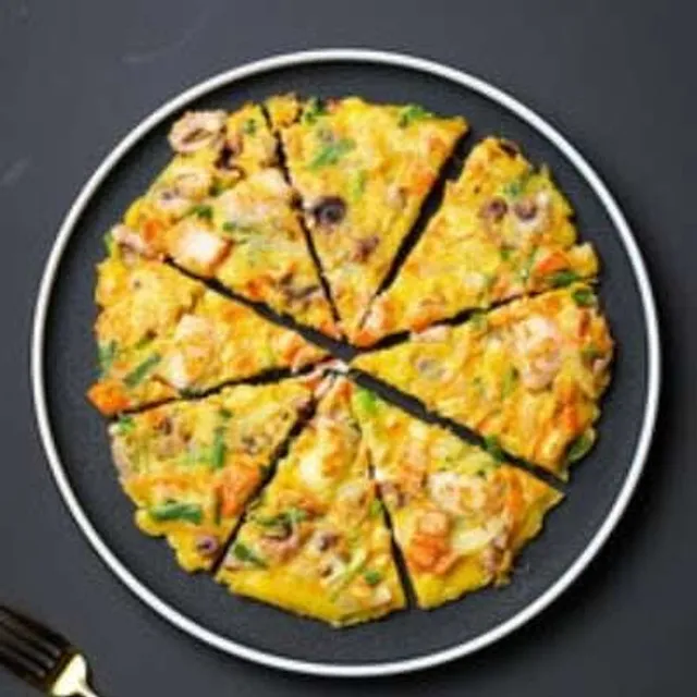 Seafood green onion pancake cut into wedges